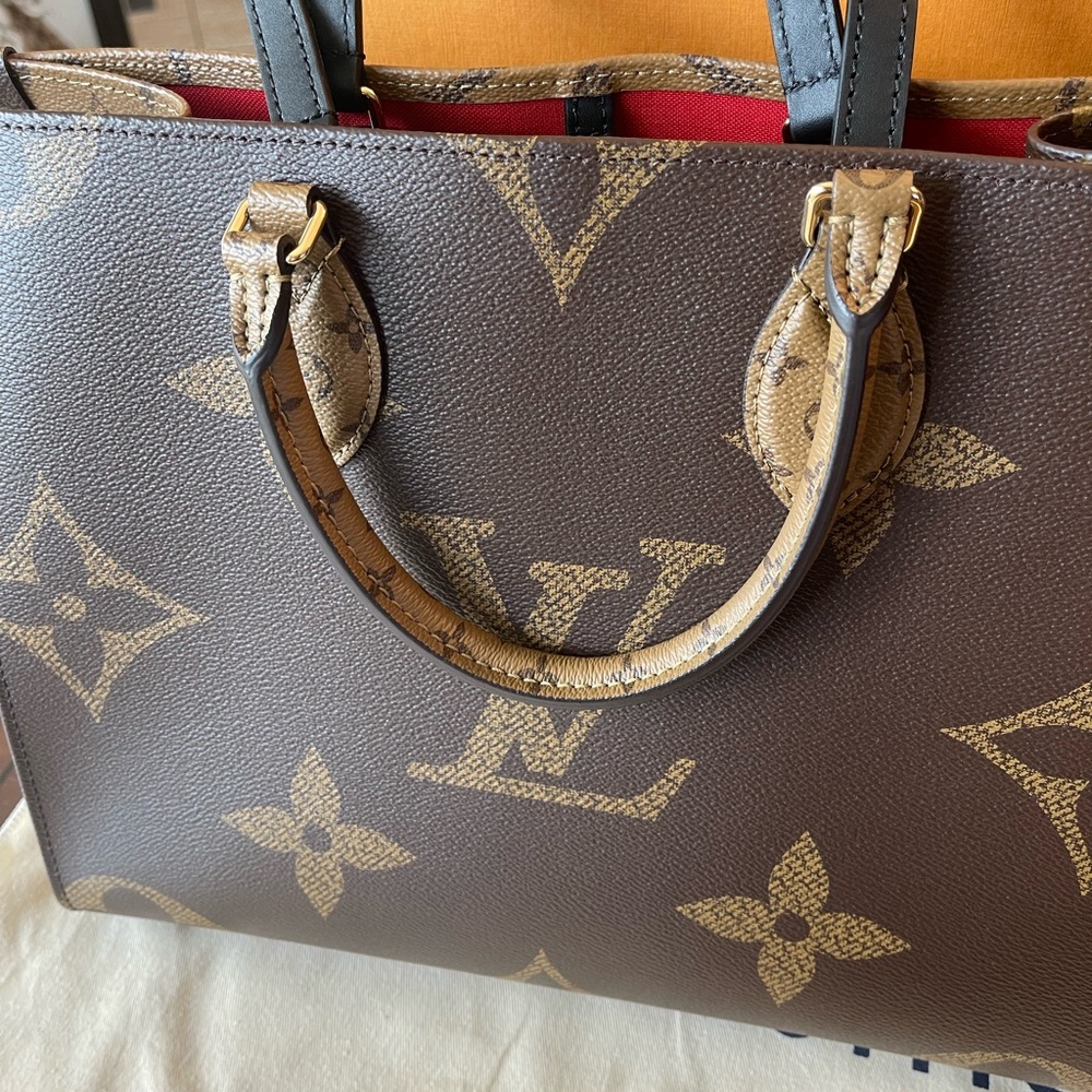 Louis Vuitton reversible tote new never used with tags. Mother Day Special Price